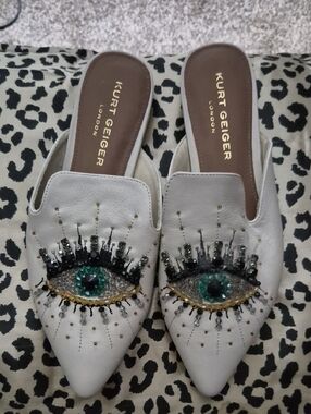 Kurt Geiger White Embellished Eye Mules with Green Gem Detail